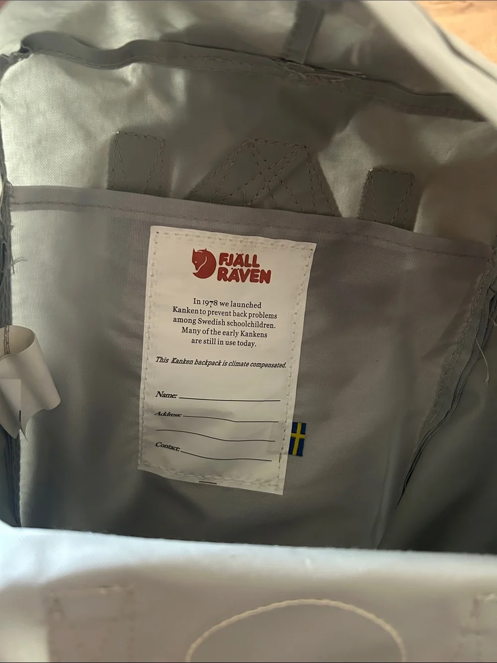 Fjallraven Kanken Mini Backpack in Light Gray with Red Logo